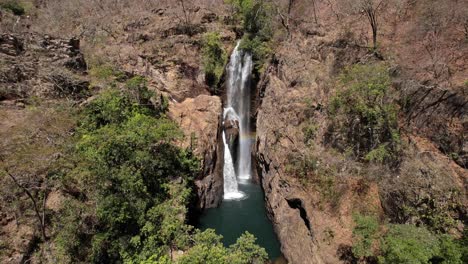 aerial-view-of-the-waterfall-Encontro-in-the-Complexo-Macaquinhos,-Chapada-dos-veadeiros,-brazil
