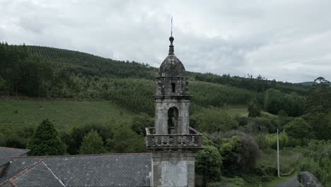 Aerial-pan-shot-of-Moeche-Church-built-in-the-15th-century-in-the-Ferrol-Region,-Galicia,-Spain