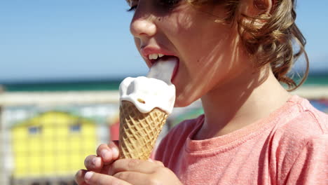 Boy-having-ice-cream-at-beach