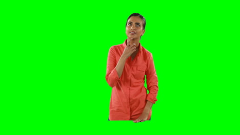 Woman-using-invisible-screen-against-green-screen-4k