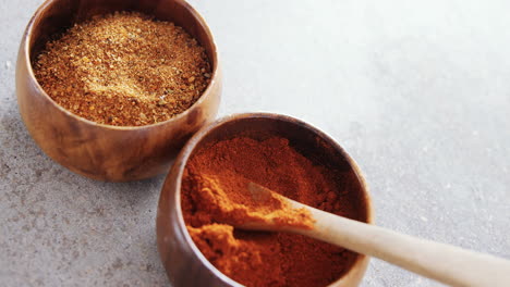 Cinnamon-powder-and-red-chili-powder-in-bowl-4k
