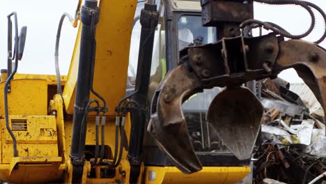 Male-worker-operating-excavator-machine-4k