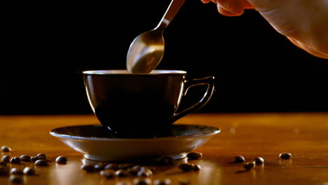 Stirring-coffee-with-spoon-4k
