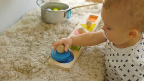 Baby-boy-playing-withe-toys-at-home-4k