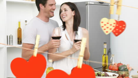 Glückliches-Junges-Paar,-Das-Wein-In-Der-Küche-Genießt