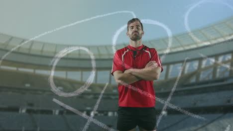 Professional-rugby-player-standing-in-front-of-a-sports-stadium-4k