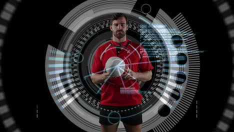 Professional-rugby-player-holding-a-ball-and-medical-data