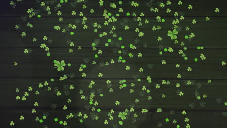 Animation-of-green-clovers-falling-for-St.-Patricks-day