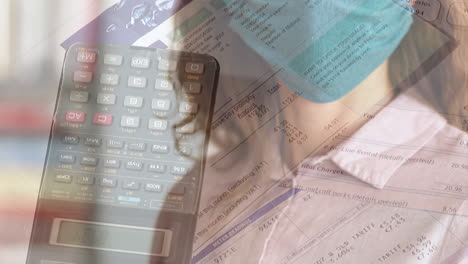 Paperwork-and-calculator-over-woman-with-mask.