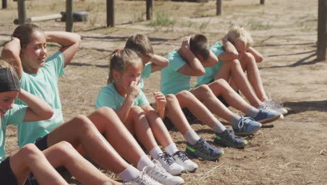 Group-of-Caucasian-children-training-at-boot-camp-