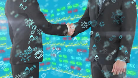 Covid-19-icons-over-two-businessman-shaking-hands-against-stock-market-data-processing