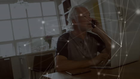 Web-of-connections-against-senior-man-talking-on-smartphone