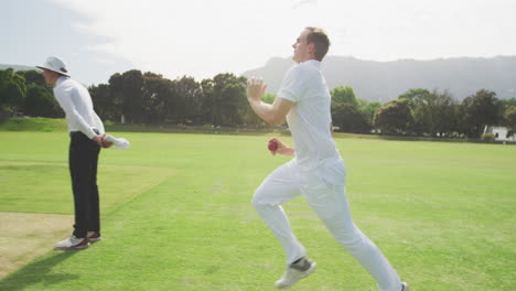 Side-view-of-cricket-payer-throwing-a-ball