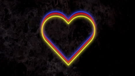 Animation-of-red-yellow-and-blue-neon-hearts-flashing-on-dark-wall