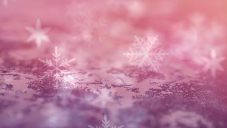 Animation-of-multiple-snowflakes-falling-over-pink-surface