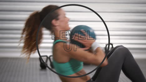 Animation-of-level-up-text-in-black-circle-outline-over-woman-exercising-with-ball-in-background