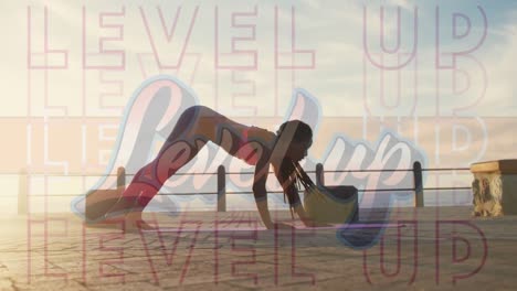 Digital-composition-of-level-up-text-against-woman-performing-plank-exercise-on-the-promenade