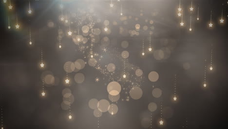 Glowing-stars-falling-and-spots-of-light-against-grey-background
