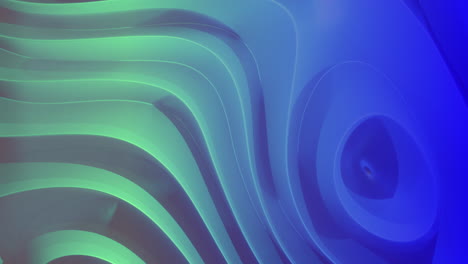 Green-and-blue-light-and-shadwo-playing-on-moving-3d-grooved-abstract-shape