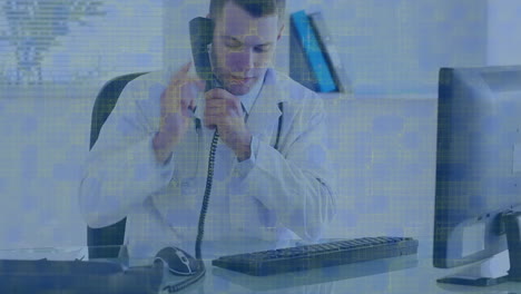 Animation-of-digital-screen-over-male-doctor-talking-on-smartphone-using-computer