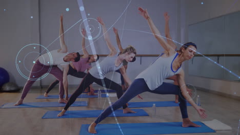 Animation-of-data-processing-over-group-practicing-yoga,-meditating