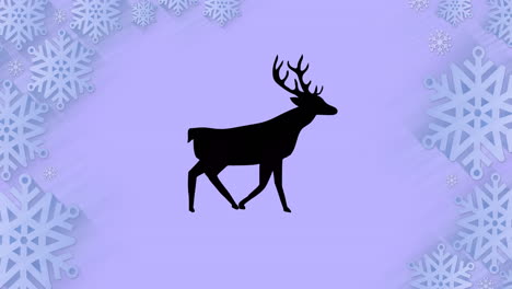 Black-silhouette-of-reindeer-walking-over-snowflakes-forming-a-frame-against-purple-background