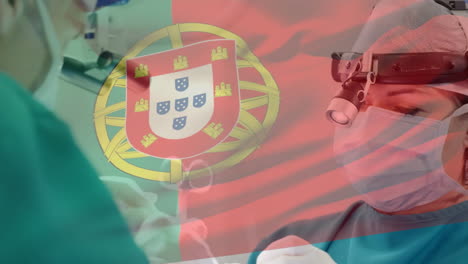 Animation-of-flag-of-portugal-over-surgeons-in-operating-theatre