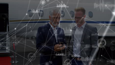 Animation-of-networks-of-connections-over-business-peoples-using-smartphone-at-airport