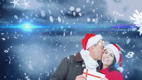 Animation-of-happy-caucasian-couple-wearing-santa-hats-over-winter-scenery