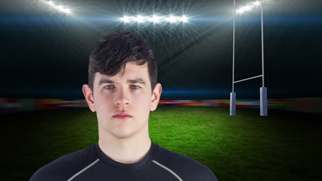 Animation-of-caucasian-male-rugby-player-holding-ball-over-stadium