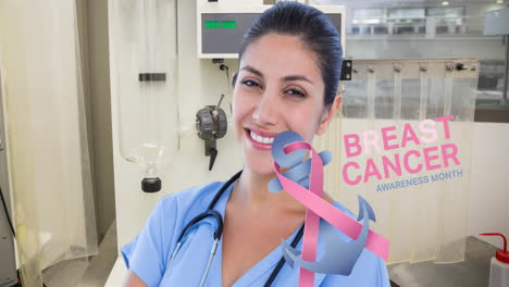 Animation-of-breast-cancer-awareness-ribbon-and-text-over-happy-caucasian-female-doctor