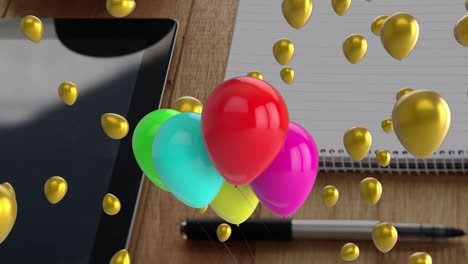Animation-Von-Luftballons-über-Notebook-Und-Tablet