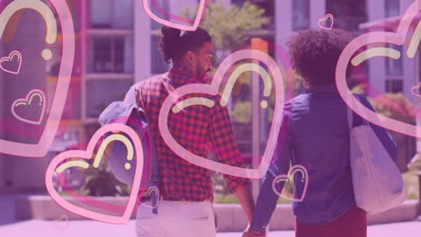 Multiple-pink-heart-icons-floating-against-african-american-couple-holding-hands-while-walking
