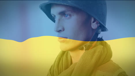 Animation-of-flag-of-ukraine-over-caucasian-male-soldier-with-weapon