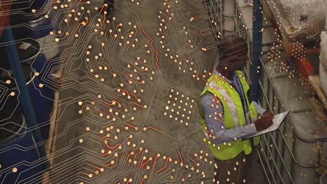 Animation-of-integrated-circuit-over-african-american-warehouse-worker
