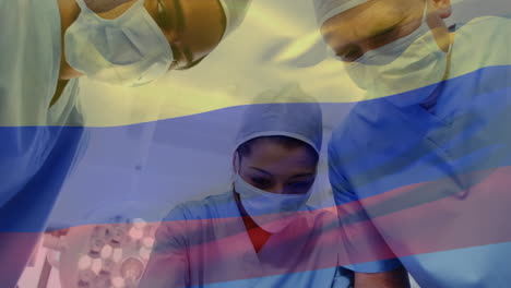 Animation-of-flag-of-colombia-over-diverse-surgeons