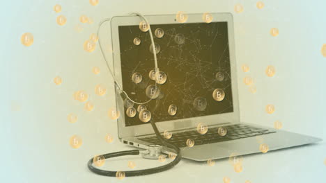 Animation-of-bitcoin-symbols-against-laptop-and-stethoscope-against-grey-background
