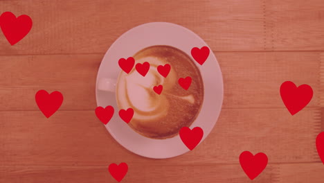Animation-of-hearts-over-cup-of-coffee