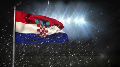Animation-of-illuminated-particles-over-waving-flag-of-croatia-on-pole-against-lights-in-stadium