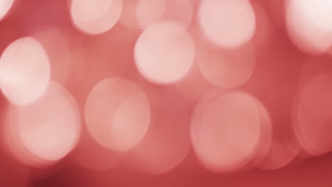 Video-of-flickering-white-and-red-bokeh-spots-of-light-with-copy-space