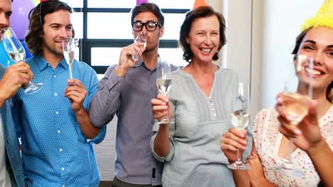 Businesspeople-toasting-glasses-of-wine