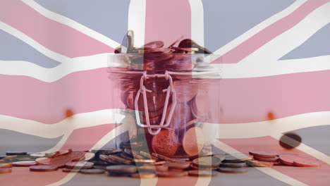 Animation-Eines-Glases-Mit-Münzen-über-Der-Flagge-Großbritanniens
