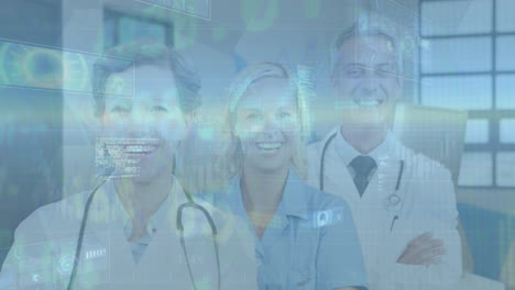 Animation-of-stock-market-data-processing-over-portrait-of-team-of-medical-workers-smiling