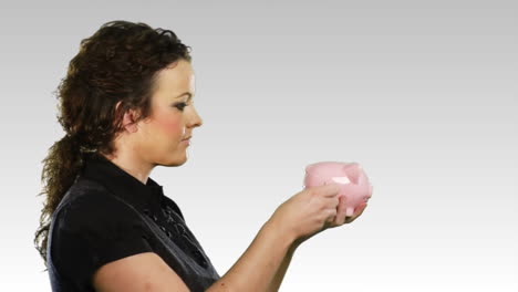 Woman-with-a-piggy-bank