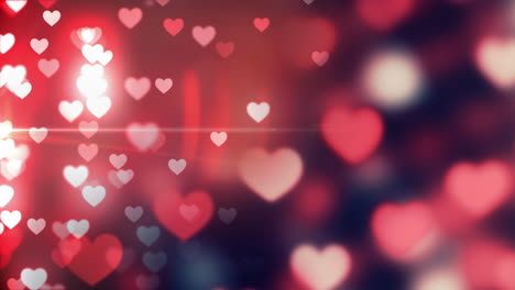 Animation-of-falling-glowing-red-hearts-over-dark-background