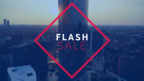 Animation-of-flash-sale-text-in-red-frame-over-cityscape