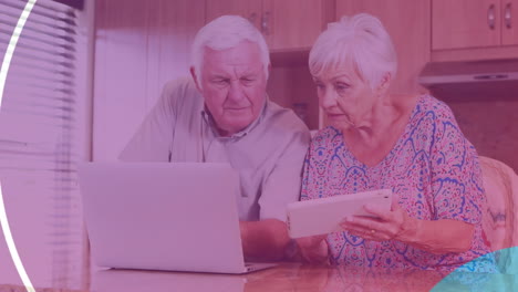 Animation-of-happy-caucasian-senior-couple-with-laptop-screen-over-new-home