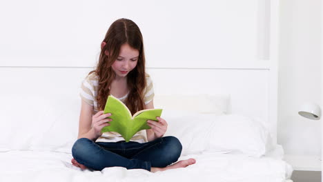 Cute-girl-reading-a-book