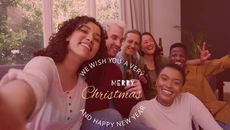 Animation-of-merry-christmas-text-over-diverse-friends-smiling