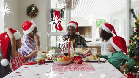 Animation-of-snow-falling-over-african-american-family-having-dinner